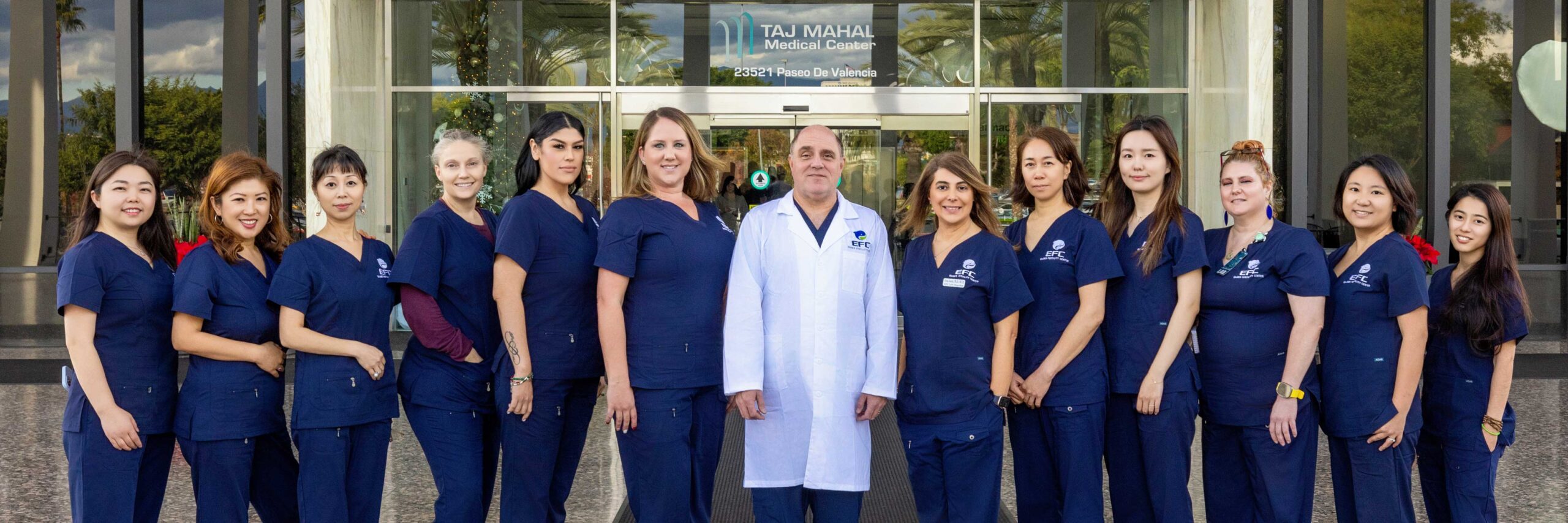 Ember Fertility Center staff standing in a row in front of the Taj Mahal Medical Center in Orange County, CA
