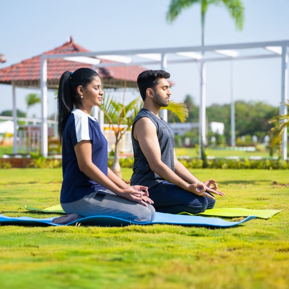 Couple meditating | Lifestyle choices for trying to conceive | Ember Fertility | Orange County, CA