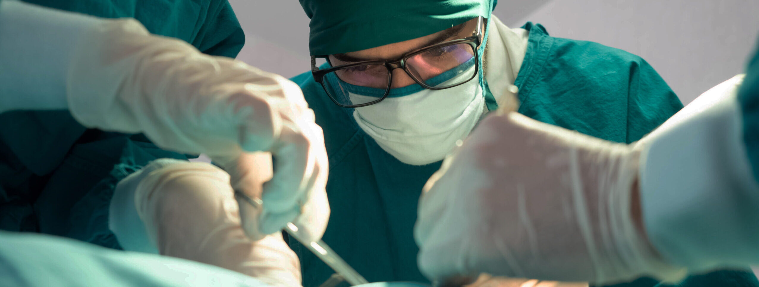 Doctors performing laparoscopy surgery at Ember Fertility Center | Laguna Hills & Orange County, CA