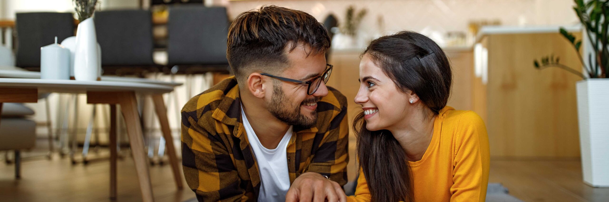 Happy couple discusses recurrent miscarriage treatment plan at Ember Fertility Center | Laguna Hills & Orange County, CA
